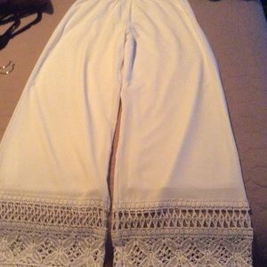 Beautiful white pants with lace on the bottom